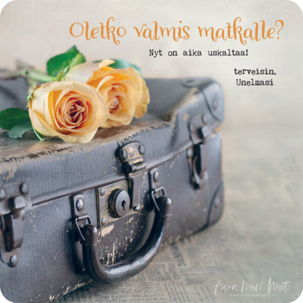 vanha matkalaukku ruusu
